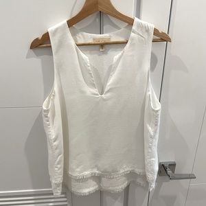 White sleeveless blouse